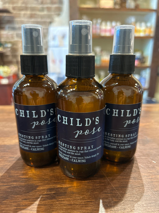 bottle of child's pose spray