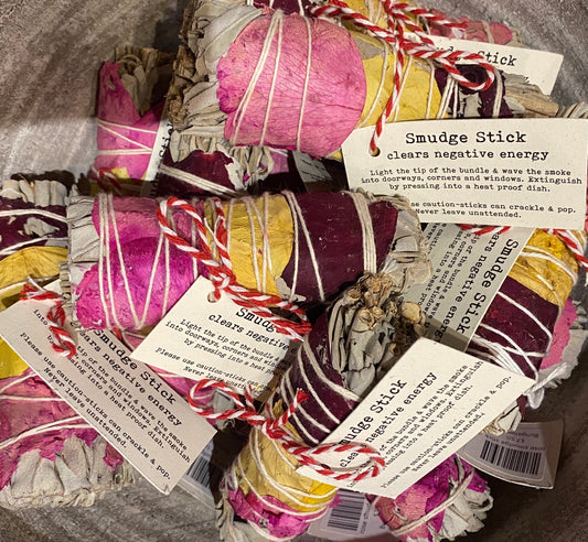 a basket of smudge sticks