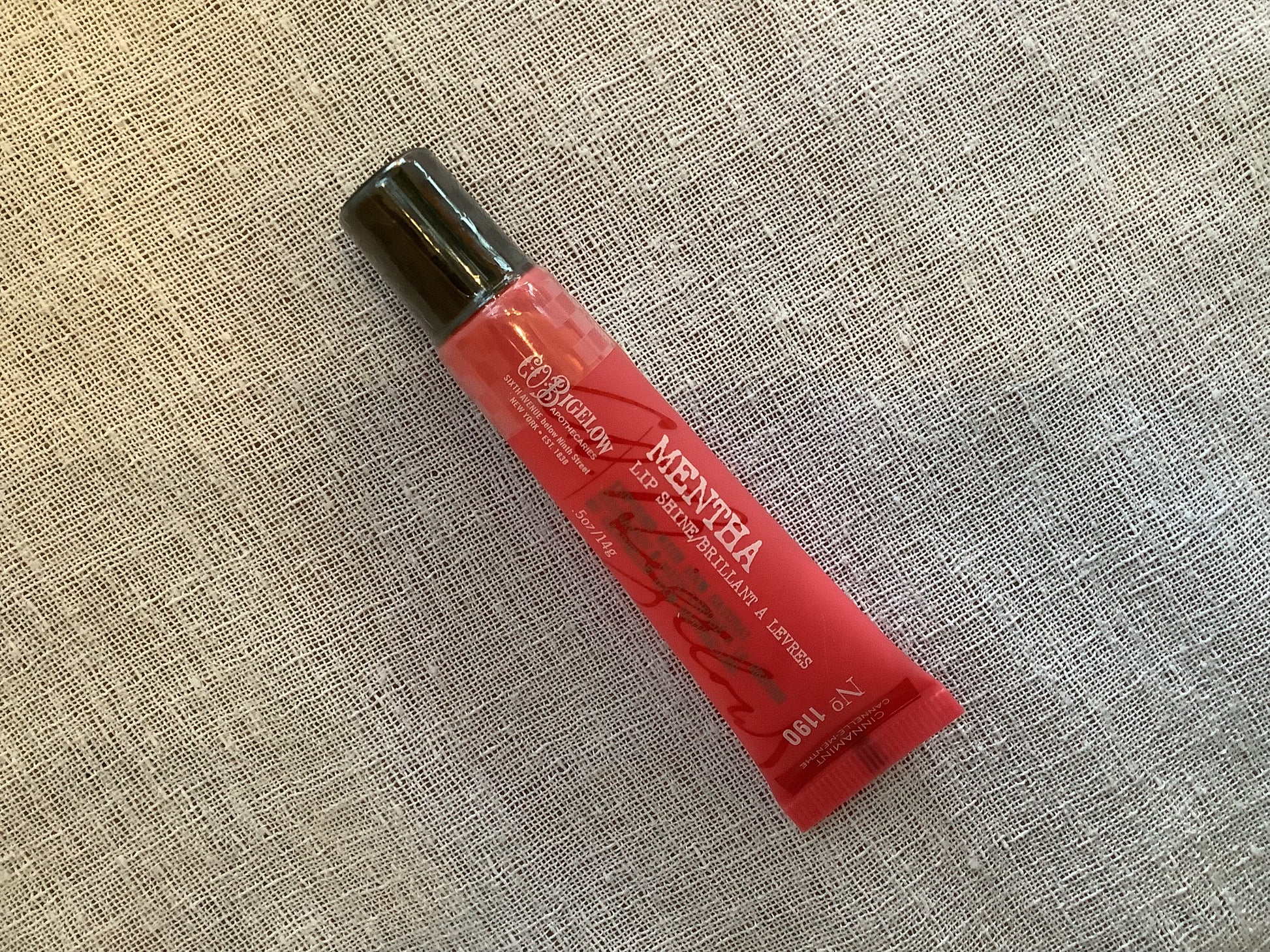 Red tube of C.O. Bigelow lip cream