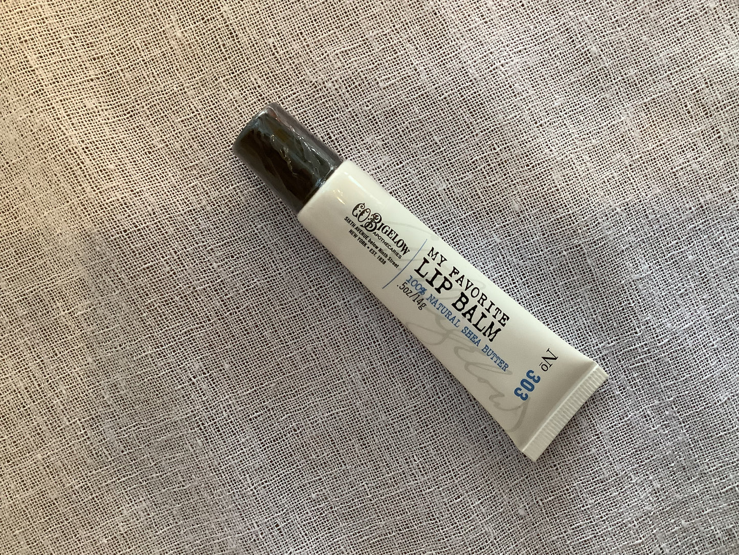 White tube of C.O. Bigelow lip balm