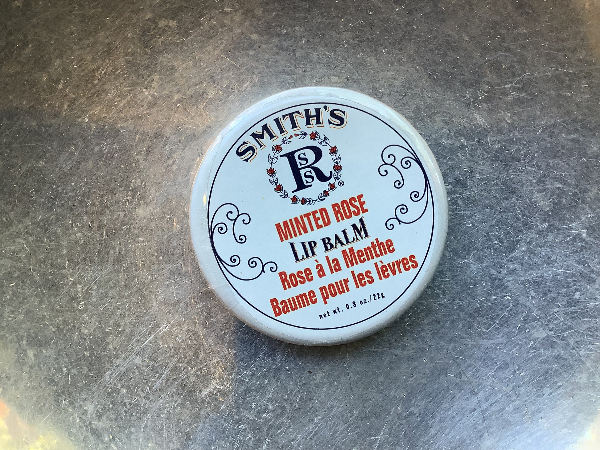 Container of Smith's minted rose lip balm