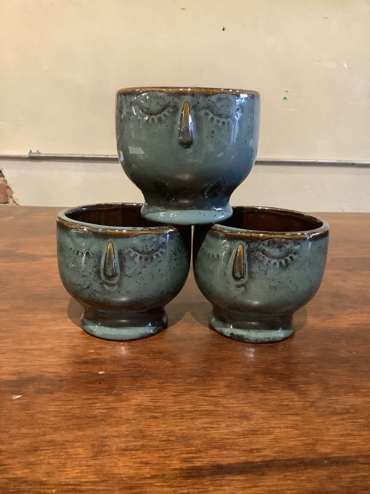 Blue-green glazed cups
