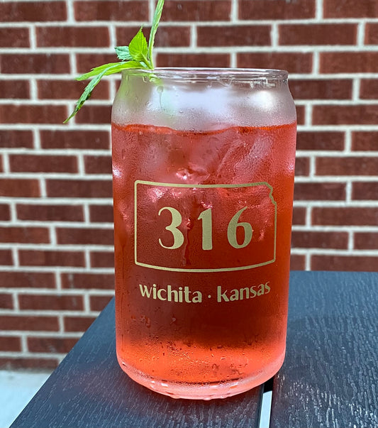 drinking glass with area code 316 and wichita kansas printed on it