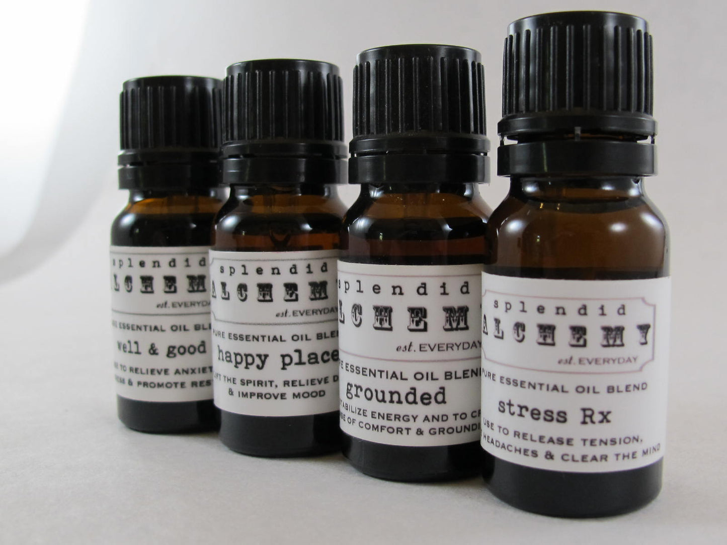 bottles of Spendid Alchemy stress rx oil